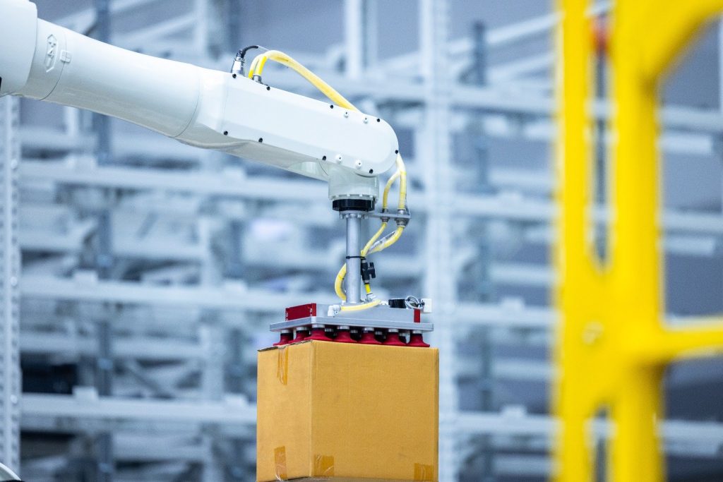 robotic arm picking up box