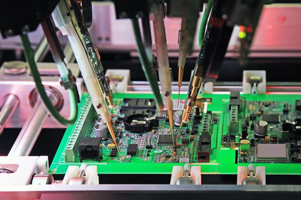 flying probe testing machine performing automated inspections on pcb